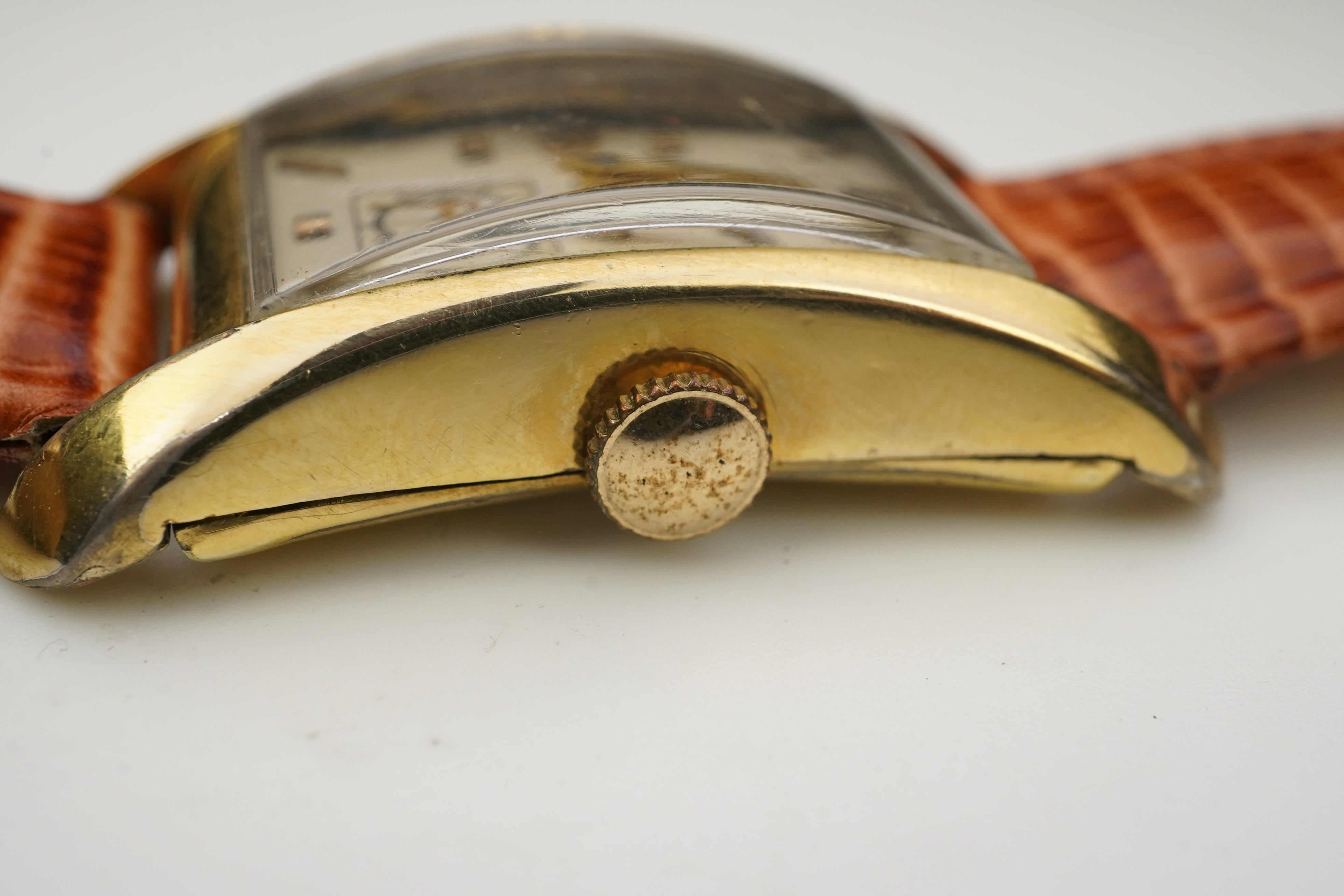 A gentleman's 1950's 10k gold filled Longines manual wind wrist watch, on a later associated leather strap